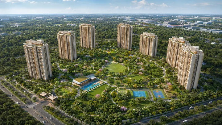 Nikoo Homes 9 aerial view of the offset high-rise tower cluster around the car-free Central Spine at KIADB Aerospace Park, Bagalur