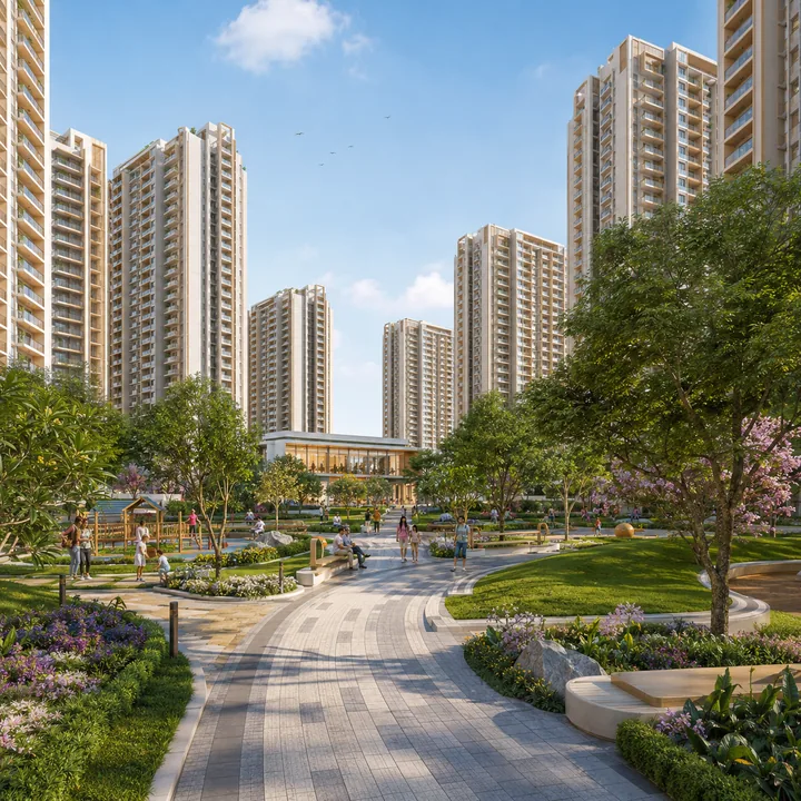 Nikoo Homes 9 car-free Central Spine — landscaped pedestrian walkway with seating courts and play areas threading between the towers